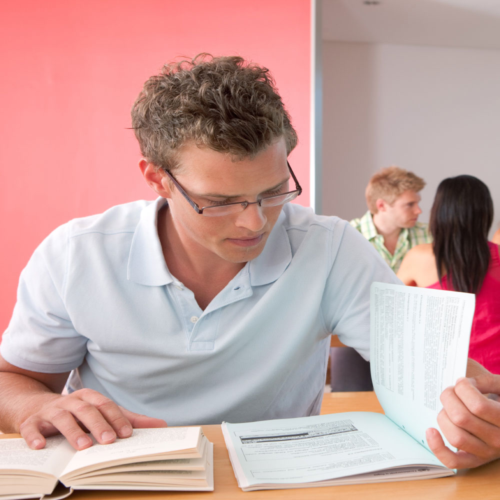 Male student studying.