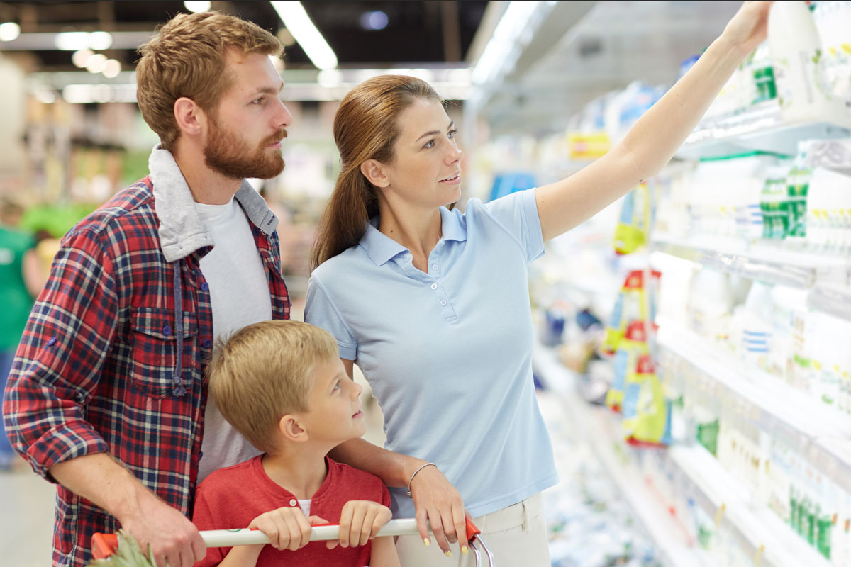 Photo of family grocery shopping